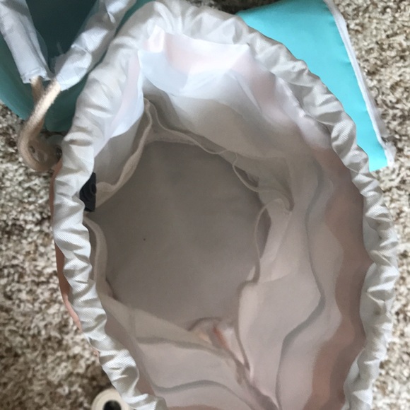 Two “Wind Blows River Flows” cosmetic bags. Each has draw string top. - Picture 2 of 6